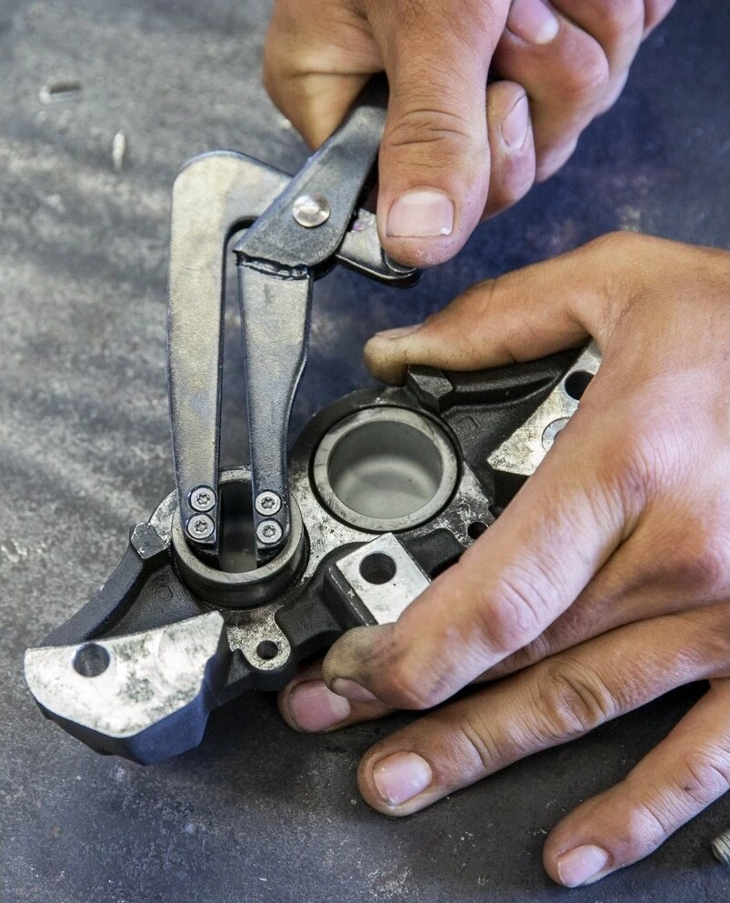 Motorcycle brake piston removal locking pliers