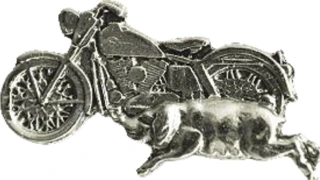 Biker pins Bike with pig pin